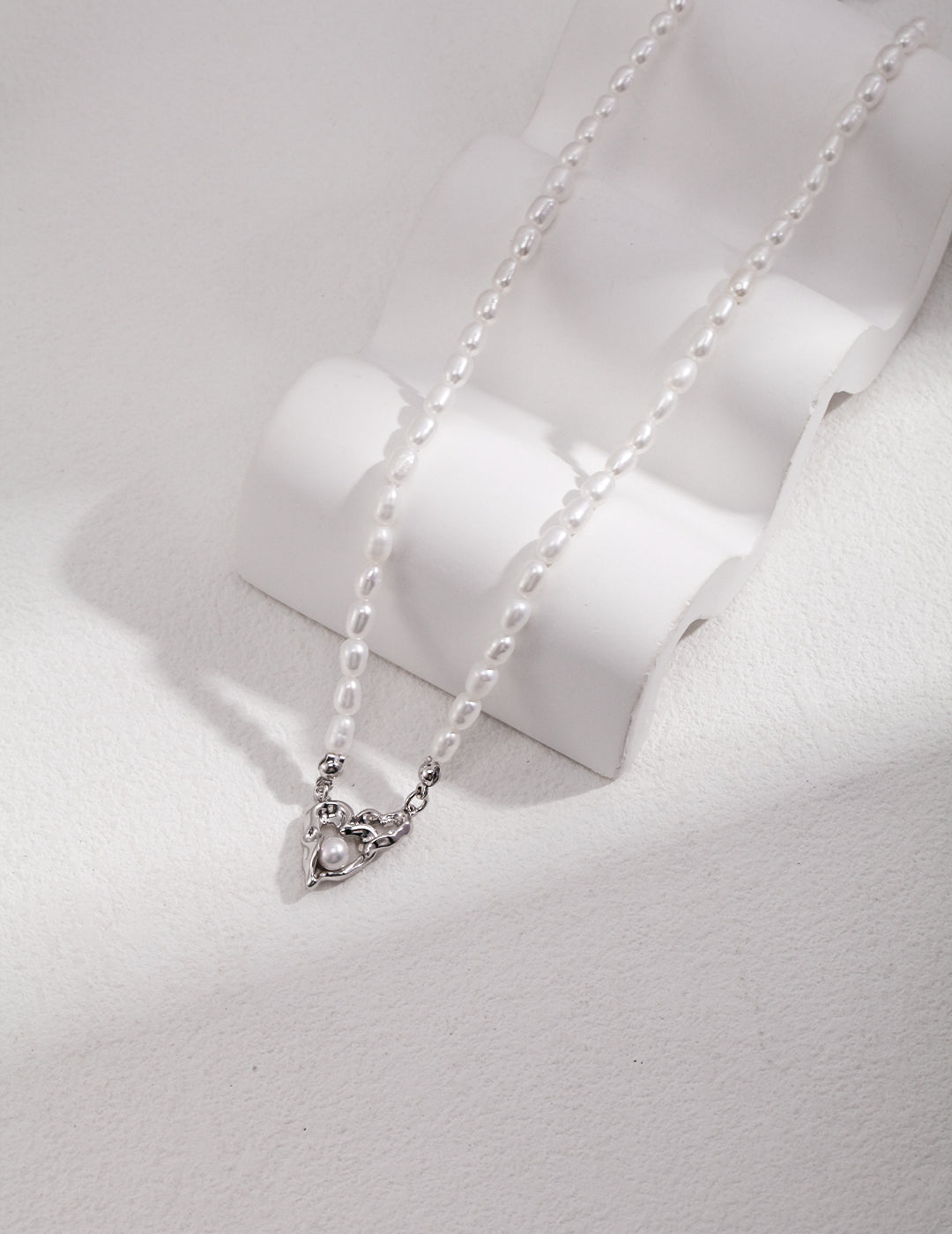 Interlocking Heart Design Silver Pearl Necklace