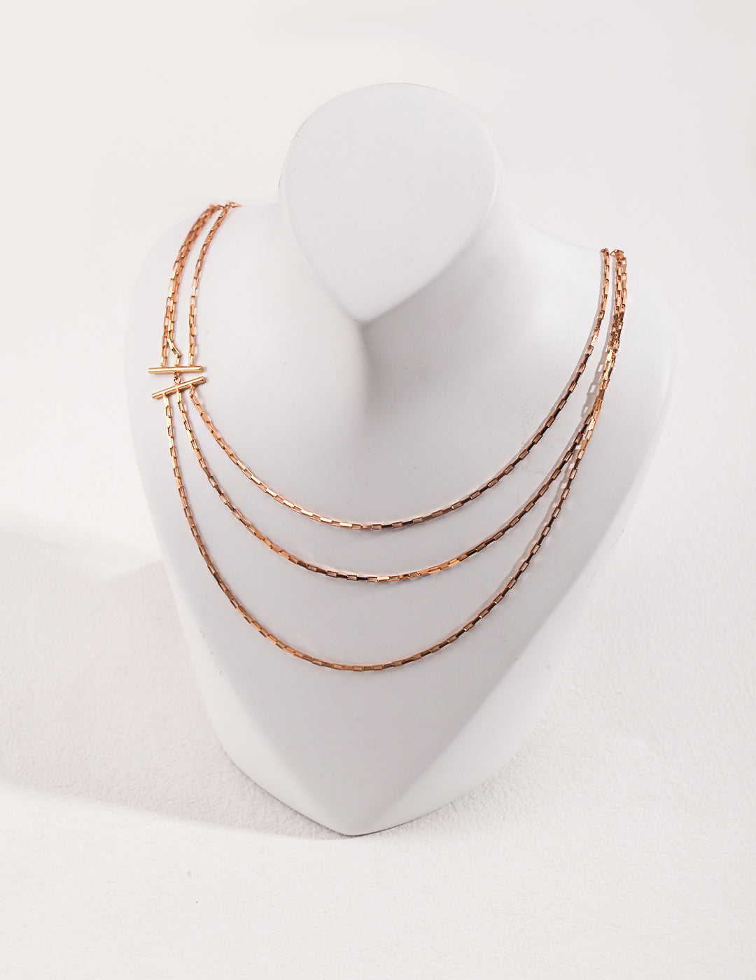 Triple Layer Silver Necklace with Modern Avant-Garde Design