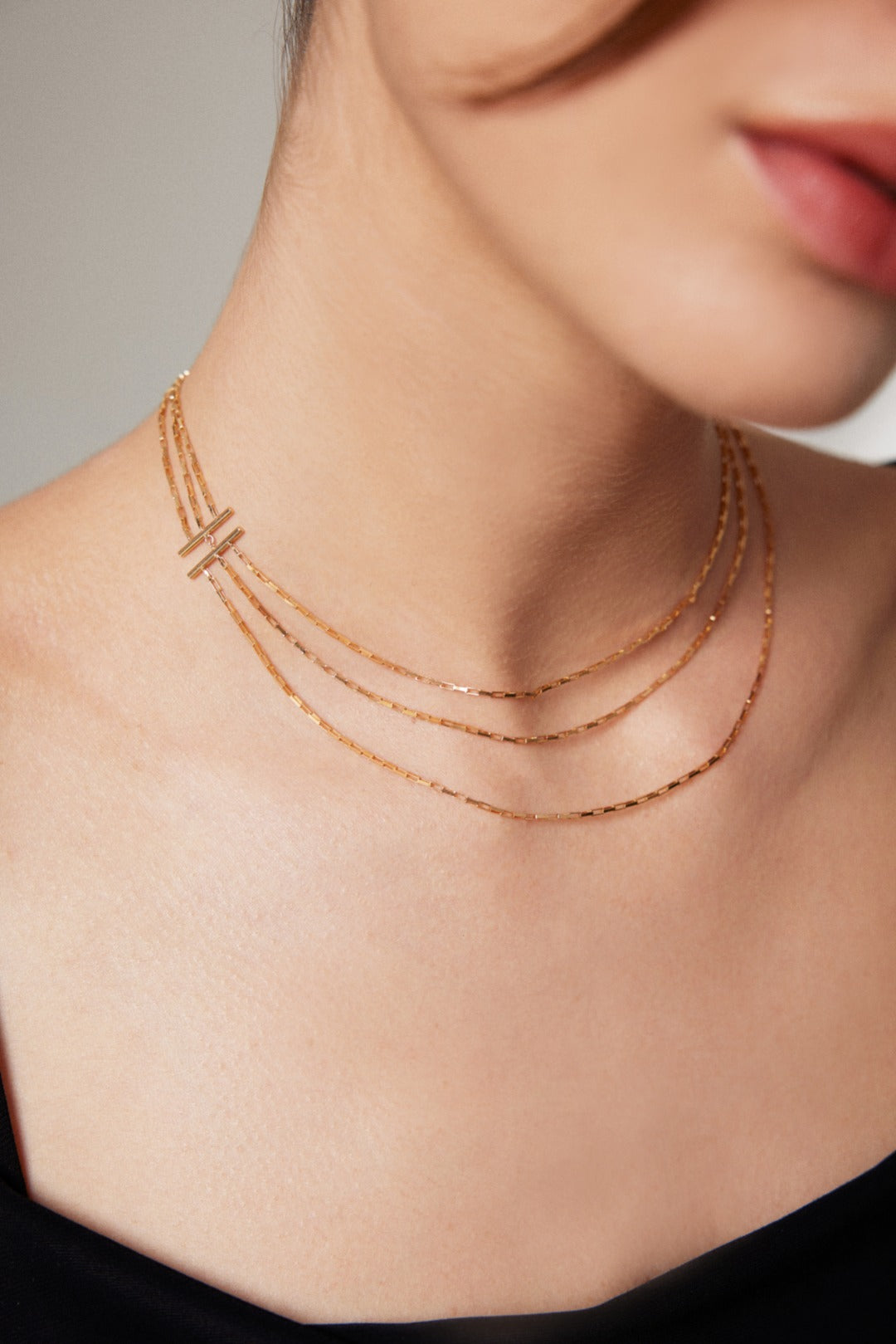 Triple Layer Silver Necklace with Modern Avant-Garde Design