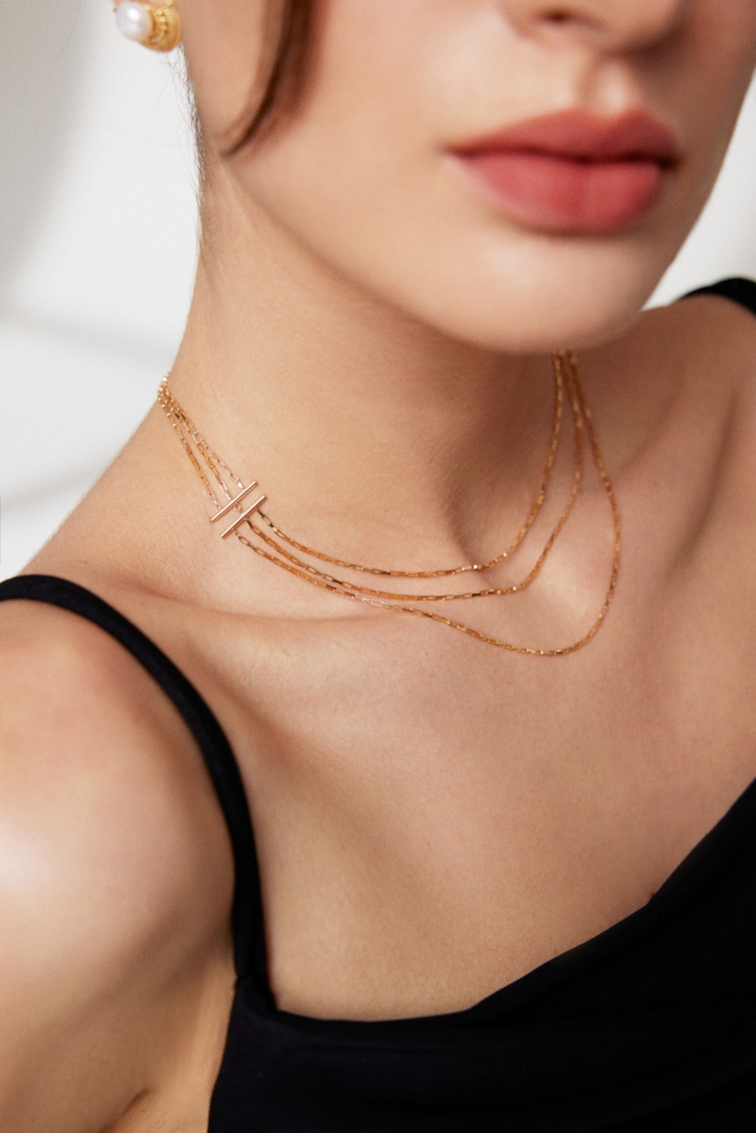 Triple Layer Silver Necklace with Modern Avant-Garde Design